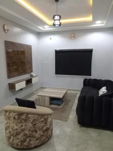 Seating area sa OD-V!CK'S CLASSIC, Wuse 2 extension, upscale Jahi district WiFi,24hr power,security, dstv