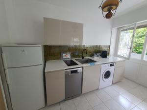 Køkken eller tekøkken på Proche Paris-Château Versailles-St Germain