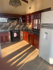 Dapur atau dapur kecil di Gästehaus Samaipata