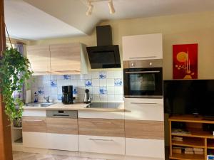 Nhà bếp/bếp nhỏ tại Nordsee 403 +6 ảnh