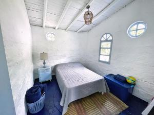 Postel nebo postele na pokoji v ubytování Hermosa Casa frente al Río