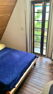 Uma cama ou camas num quarto em Hostel Praia de Moçambique