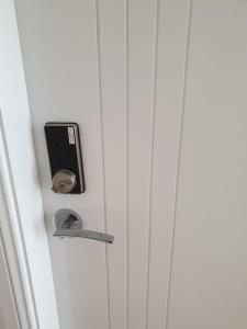 a door with a safe on the side of it at The Garden House in Sydney