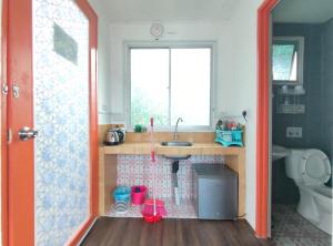 Kjøkken eller kjøkkenkrok på Nulu View Cabin