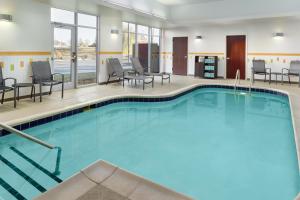 a large swimming pool in a hotel room at Fairfield Inn & Suites by Marriott Jackson in Jackson