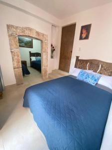Hotel Noche Azul客房内的一张或多张床位