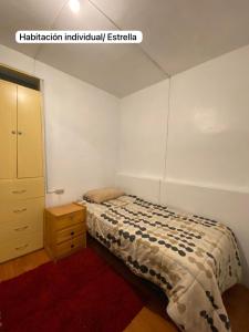 Ένα ή περισσότερα κρεβάτια σε δωμάτιο στο Casa Katya Cusco