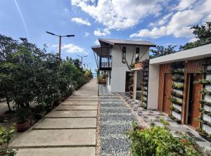 a walkway in front of a house at Mula De La Paz in Zambales