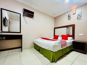 Gulta vai gultas numurā naktsmītnē Kampar Times Inn Hotel