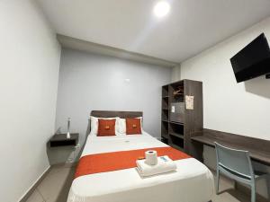 Voodi või voodid majutusasutuse HOTEL MAGIC toas