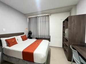 Voodi või voodid majutusasutuse HOTEL MAGIC toas