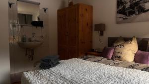Posteľ alebo postele v izbe v ubytovaní Ferienwohnungen am Riedanger + 37 fotografií