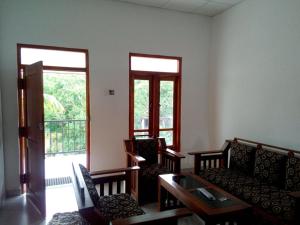 Posezení v ubytování Kumudu Holiday Home