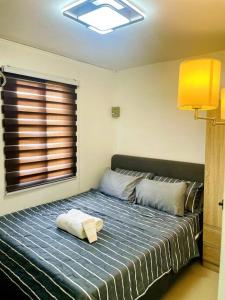 Ліжко або ліжка в номері Modern House in Butuan City with 2bedrooms in Camella