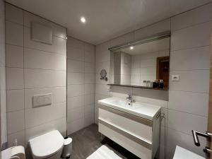 Kúpeľňa v ubytovaní Apartments Hohenberger Mallnitz - Mein Platz in den Bergen!