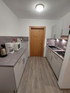 Kuchyň nebo kuchyňský kout v ubytování Haus Lenz