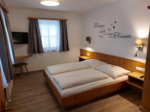 Postel nebo postele na pokoji v ubytování Haus Lenz