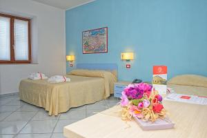 Postel nebo postele na pokoji v ubytování Victoria Resort + 37 fotografií