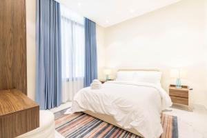 Postel nebo postele na pokoji v ubytování Amber Hospitality - Al Qairawan