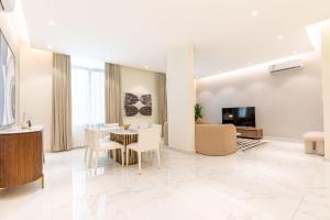 TV a/nebo společenská místnost v ubytování Amber Hospitality - Al Qairawan