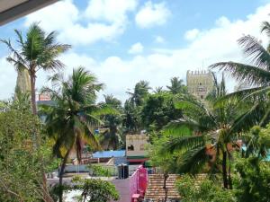 a view of a city with palm trees at Rudra Villas in Rāmeswaram