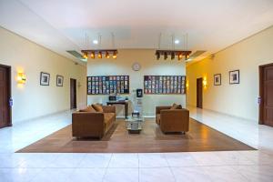 Posezení v ubytování Jambuluwuk Residence Pakubuwono + 31 fotografií