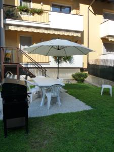 Patio lub wspólna przestrzeń na świeżym powietrzu w obiekcie Appartamento Mora