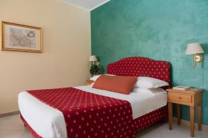 Postel nebo postele na pokoji v ubytování 5Miglia Hotel & Spa