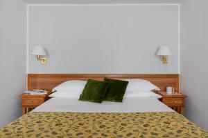 Postel nebo postele na pokoji v ubytování 5Miglia Hotel & Spa