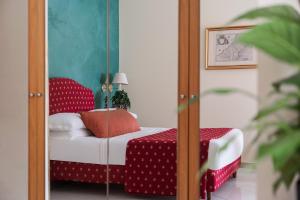 Postel nebo postele na pokoji v ubytování 5Miglia Hotel & Spa