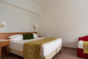 Postel nebo postele na pokoji v ubytování 5Miglia Hotel & Spa