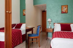 Postel nebo postele na pokoji v ubytování 5Miglia Hotel & Spa