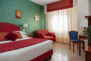 Postel nebo postele na pokoji v ubytování 5Miglia Hotel & Spa