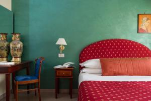 Postel nebo postele na pokoji v ubytování 5Miglia Hotel & Spa