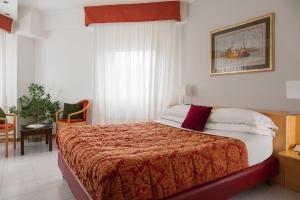 Postel nebo postele na pokoji v ubytování 5Miglia Hotel & Spa