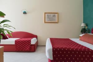 Postel nebo postele na pokoji v ubytování 5Miglia Hotel & Spa