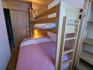 Postel nebo postele na pokoji v ubytování Appartement au lac ski aux pieds