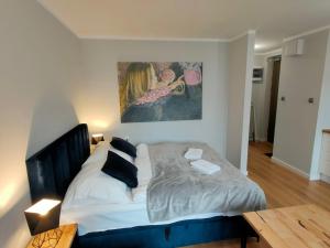 Posteľ alebo postele v izbe v ubytovaní Hugo VIP Apartments