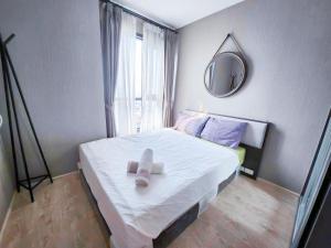 Cama o camas de una habitación en 泰国芭提雅thebase无边游泳池公寓
