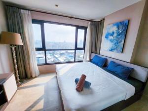 Cama o camas de una habitación en 泰国芭提雅thebase无边游泳池公寓