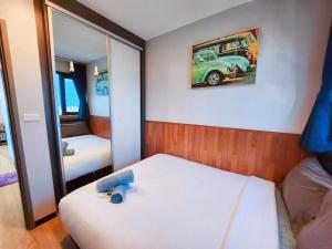 Cama o camas de una habitación en 泰国芭提雅thebase无边游泳池公寓