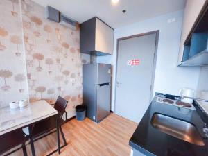 Una cocina o zona de cocina en 泰国芭提雅thebase无边游泳池公寓