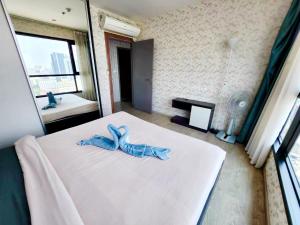 Cama o camas de una habitación en 泰国芭提雅thebase无边游泳池公寓