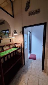 a room with a door leading to a garage at Runa Group House Samed in Ko Samed