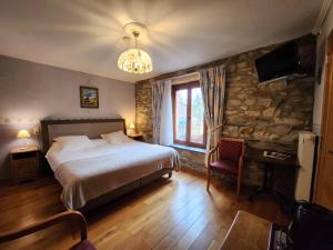 Postel nebo postele na pokoji v ubytování B&B Nord Sud