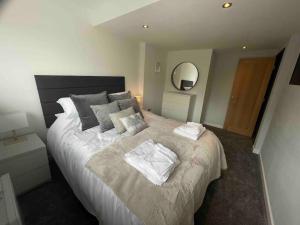 Postel nebo postele na pokoji v ubytování Roselea Cottage