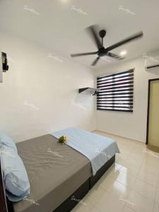 Ένα ή περισσότερα κρεβάτια σε δωμάτιο στο SmartChoice Homestay
