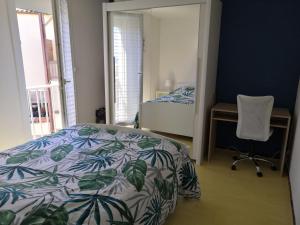 Voodi või voodid majutusasutuse Charmant appartement vue mer au Cap d'Agde toas