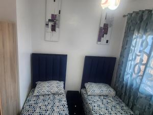 Voodi või voodid majutusasutuse Super appartement vue sur mer et à 2 minutes de la plage de Martil. toas