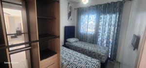 Voodi või voodid majutusasutuse Super appartement vue sur mer et à 2 minutes de la plage de Martil. toas